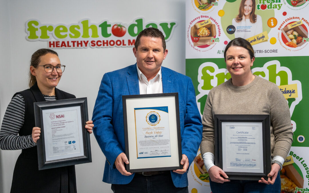 Ken , Monika & Maura From Freshtoday Holding Up Respected Awards & Certificates That Freshtoday Has Earned